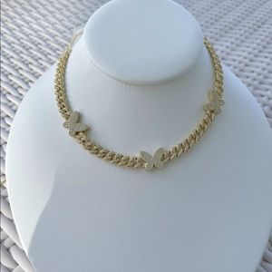 Beautiful brass gold coated necklace with diamond and butterfly detail